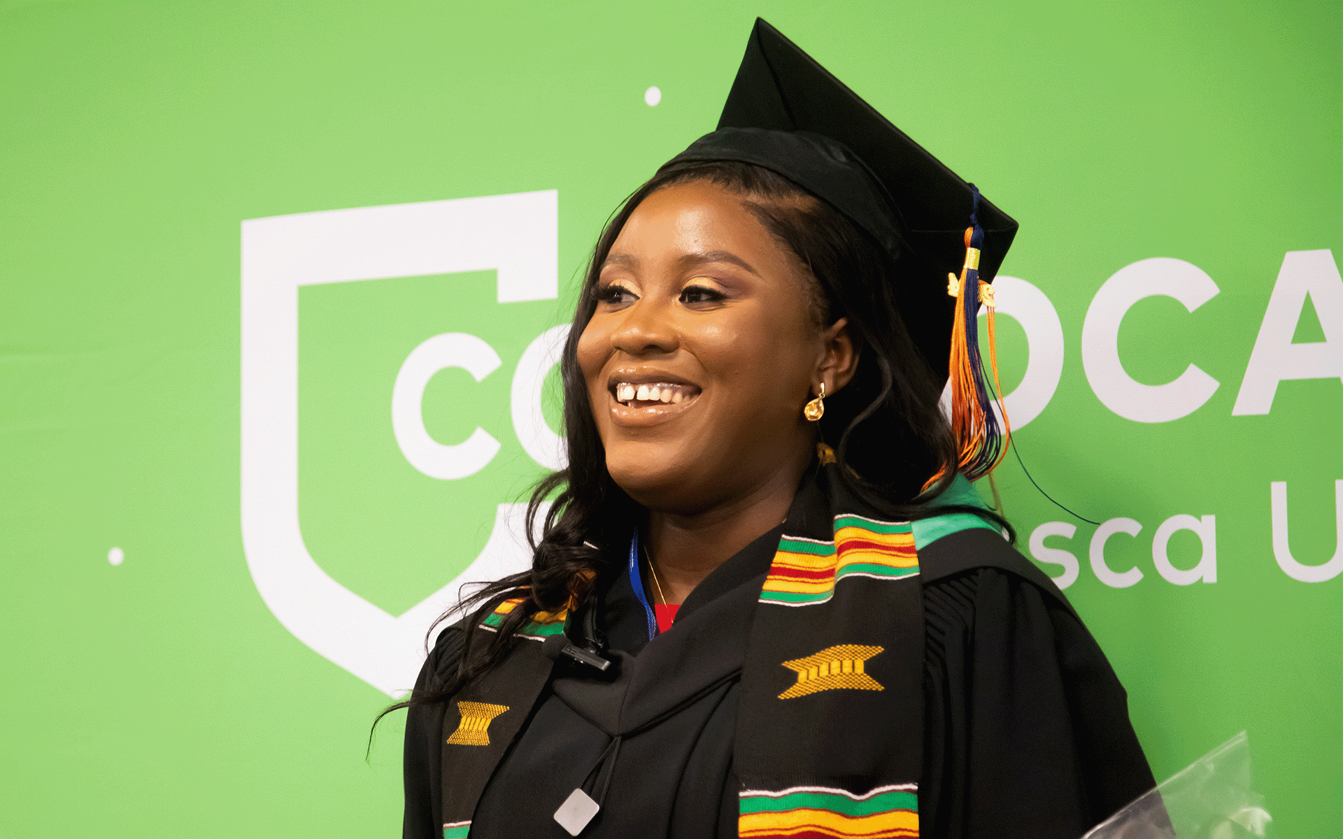 Close up shot of graduate smiling