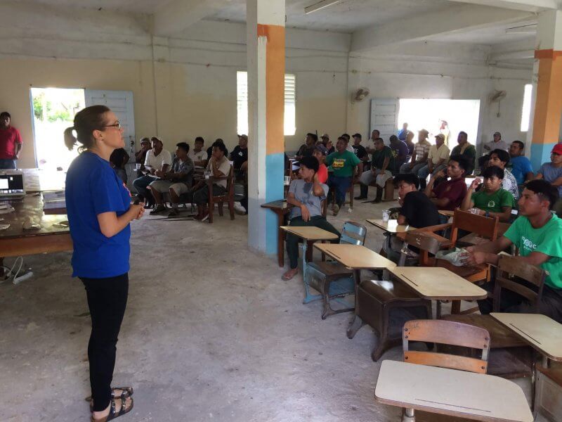 Dr. Peuramaki-Brown speaking to group of residents near the archeological site.