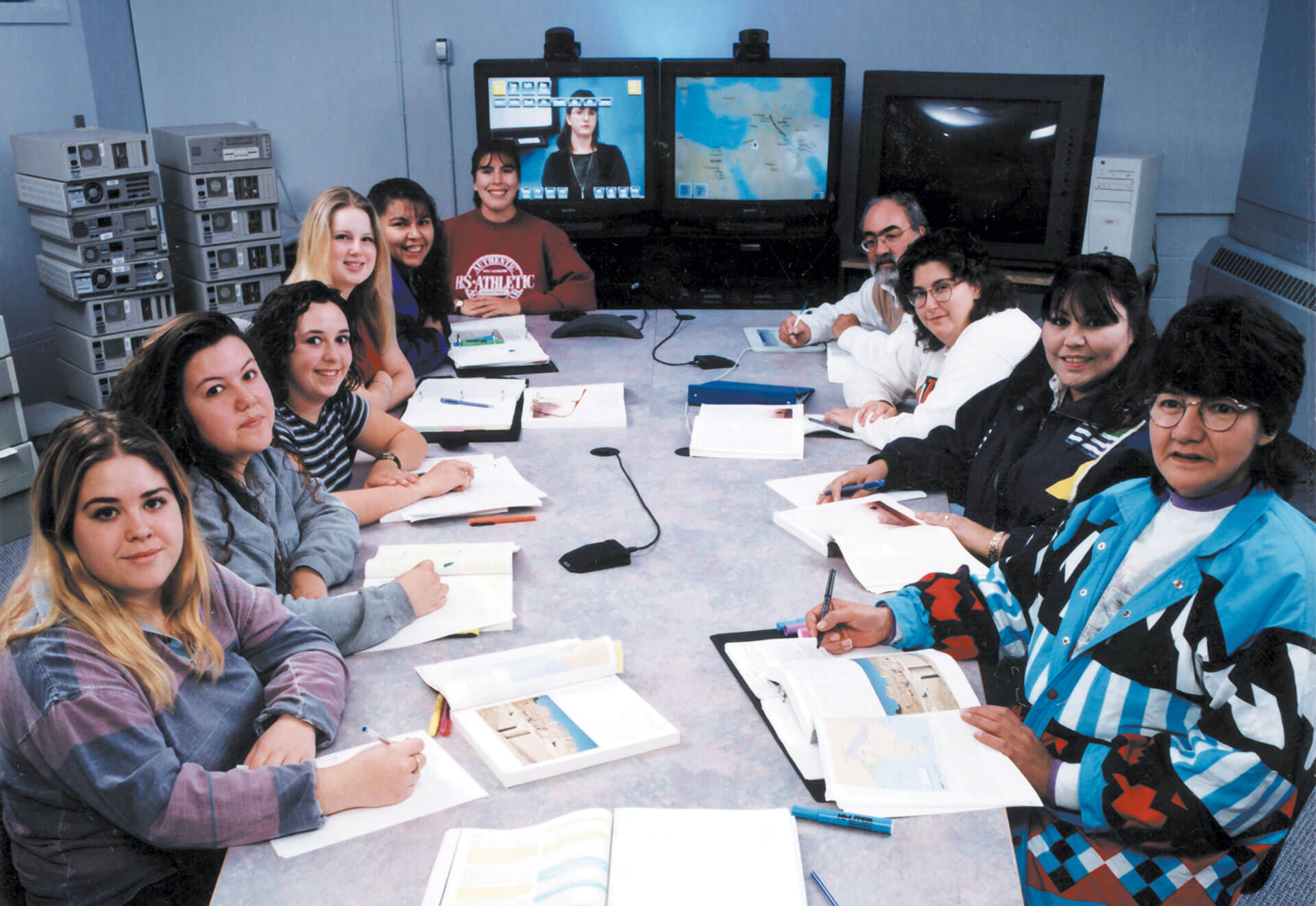 A group of students seated at a large table