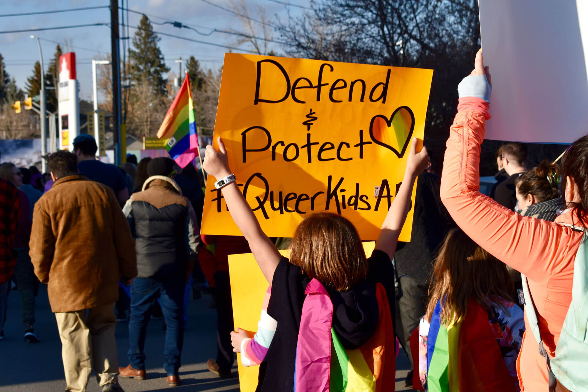 Protest with sign that reads 