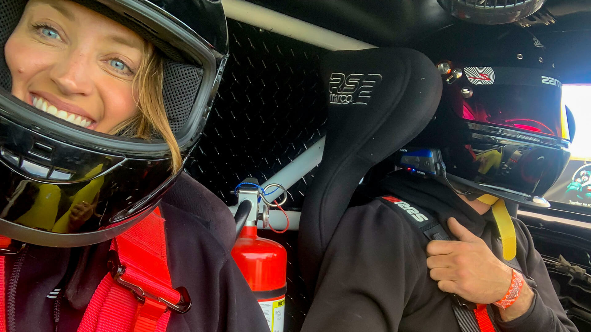 Athabasca University online learner Alicia Fisher inside a vehicle during a race