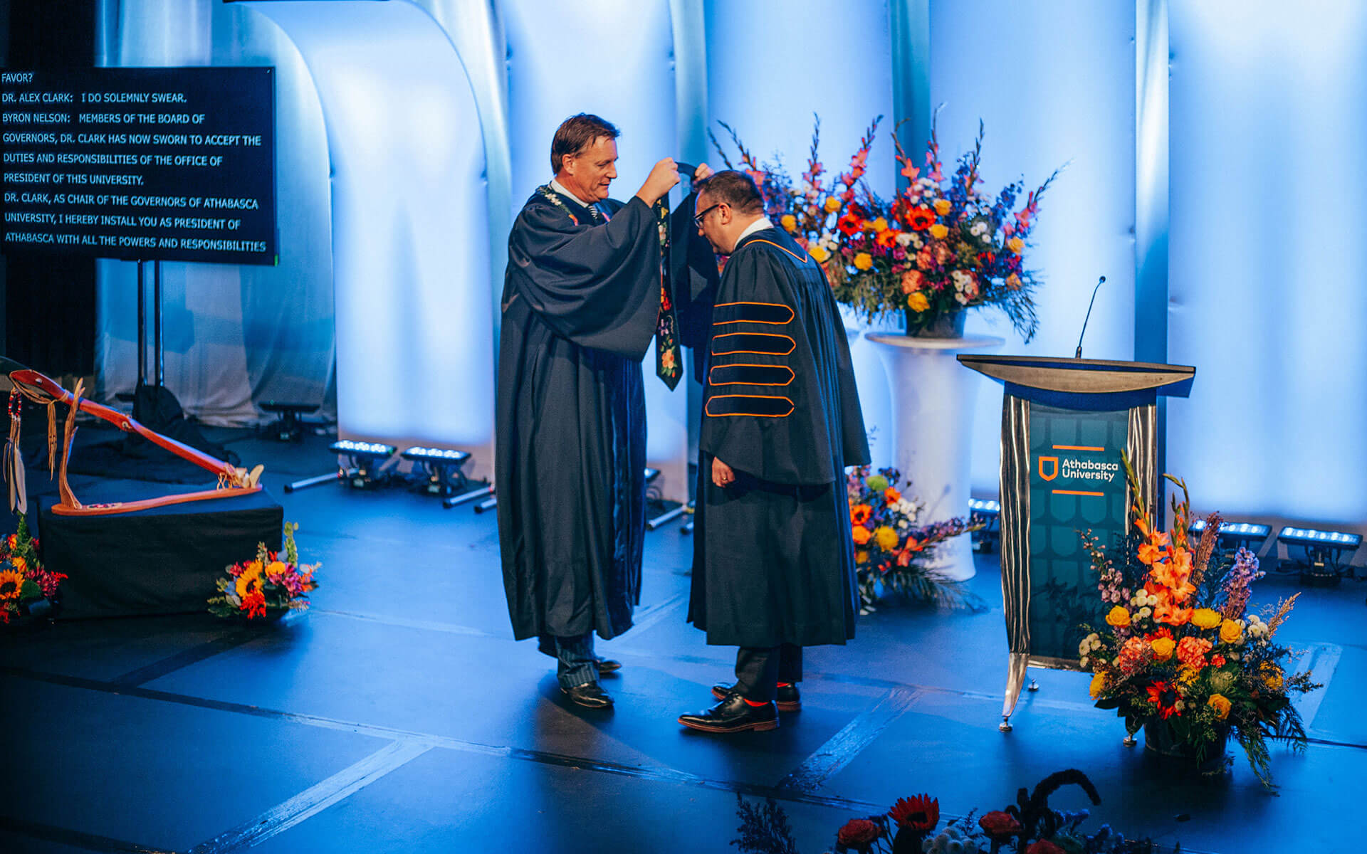 AU board chair Byron Nelson (left) with Dr. Alex Clark