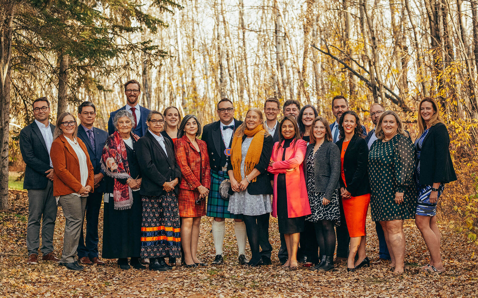 Member of AU's senior leadership team gather for a group photo following the installation of Dr. Alex Clark as university president.