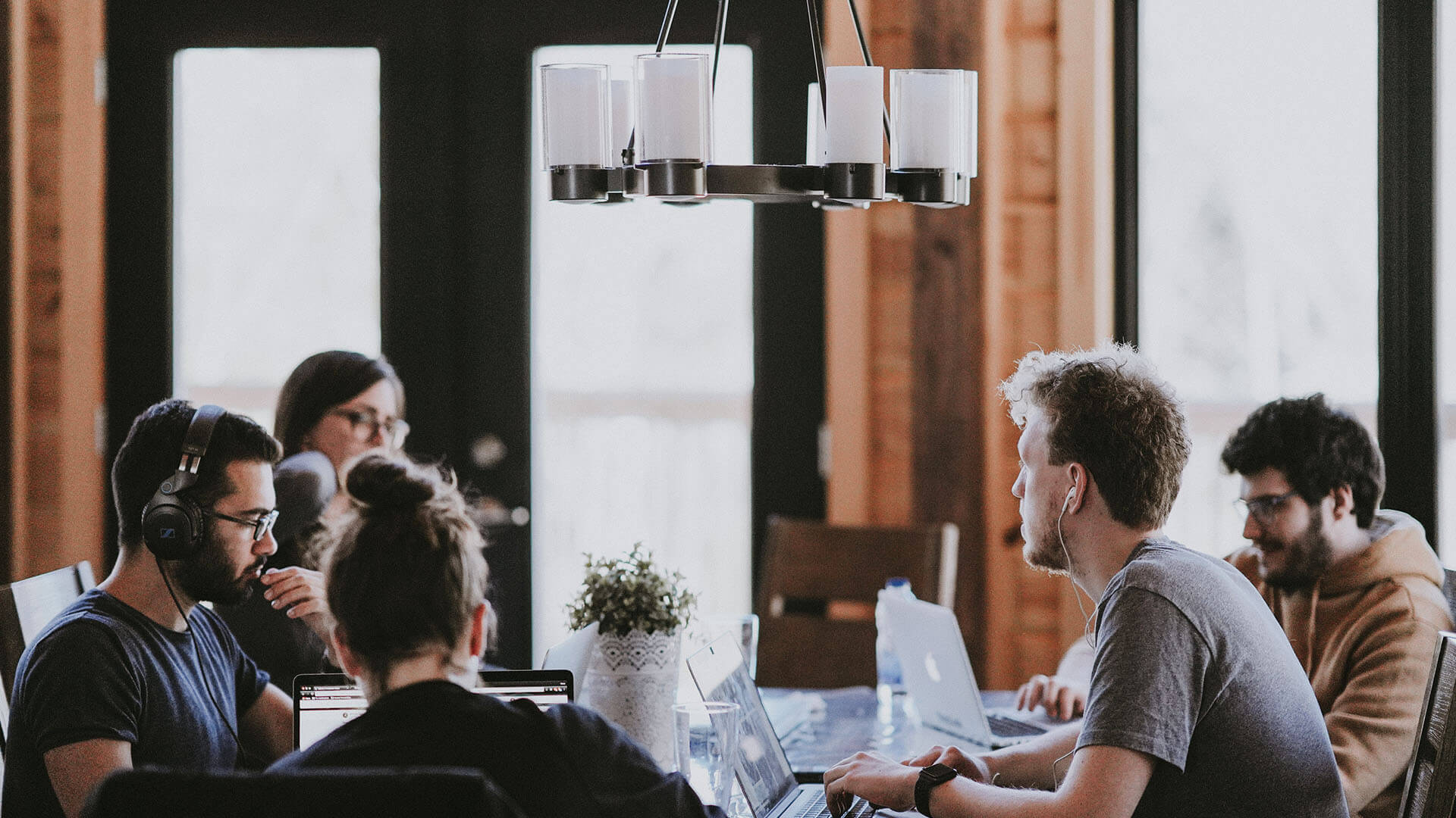 A group of people working together in a collaboration space