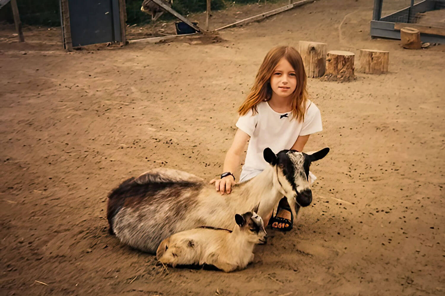 Linea Xaysana with goats on the family farm in Invermere, B.C.