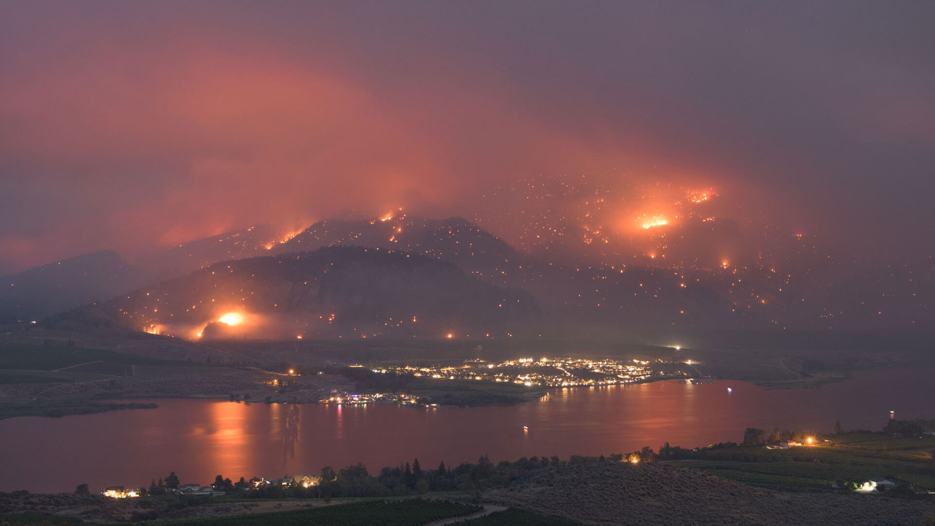 Wildfire burning near Osoyoos at night time.